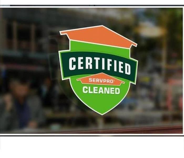 Certified: SERVPRO Cleaned sign on window